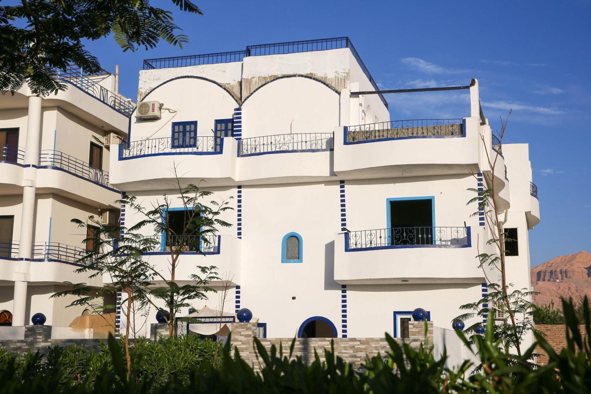 Sharqotel Otel *
