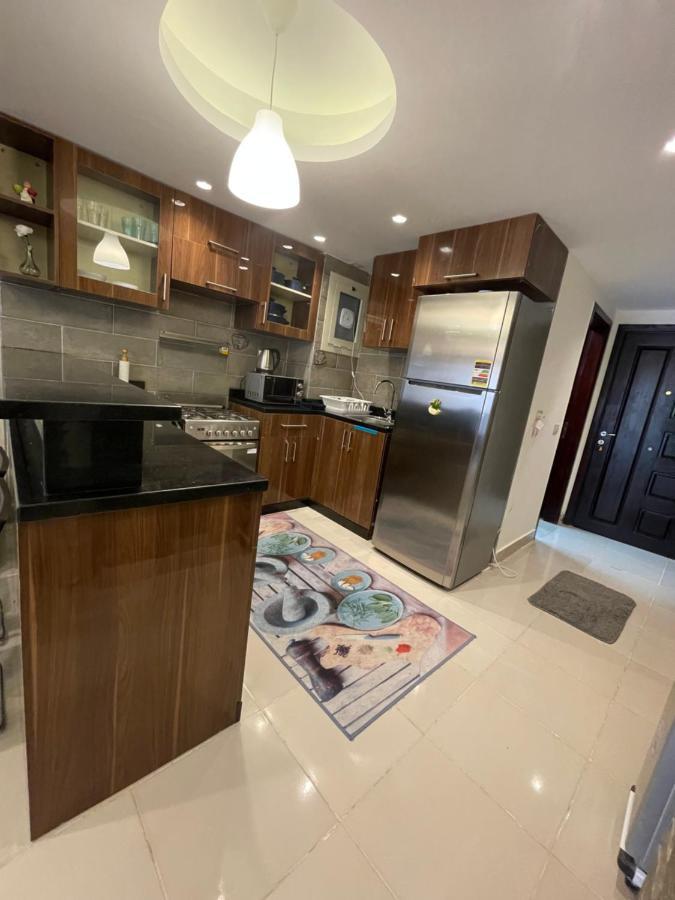 مارينا ريديزنس الساحل الشمالي امام ابراج العالمين الجديدة Apartment *