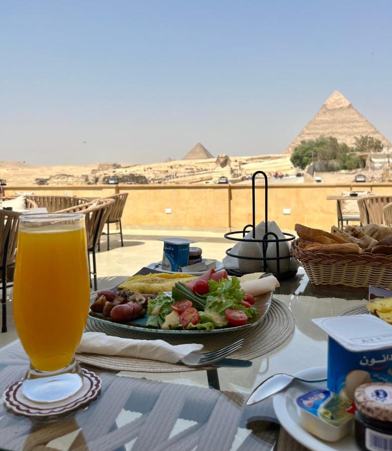 The Gate Front Pyramids & Sphinx View * Kafrat al Jabal