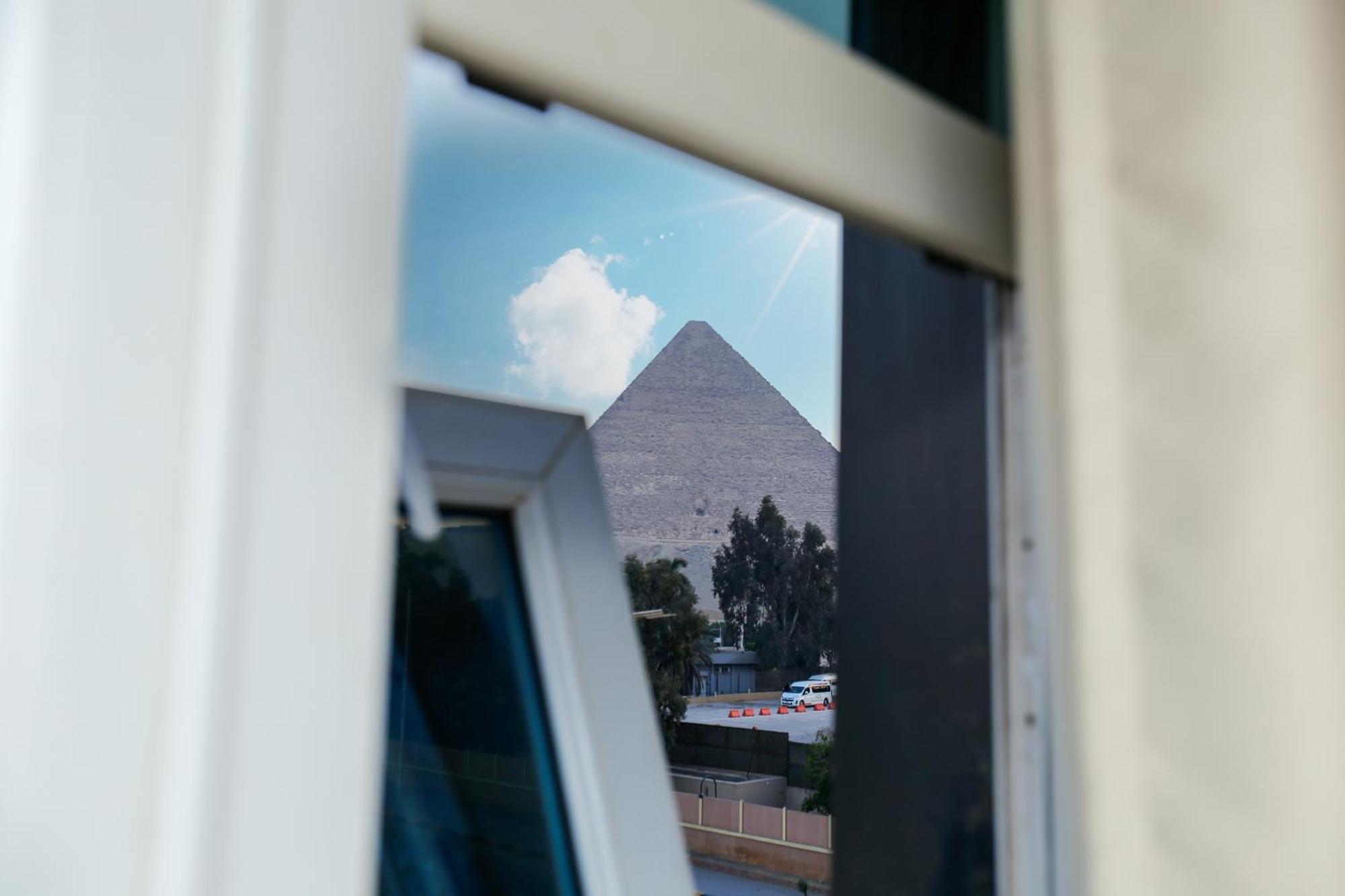 Turquoise Pyramids & Grand Egyptian Museum View