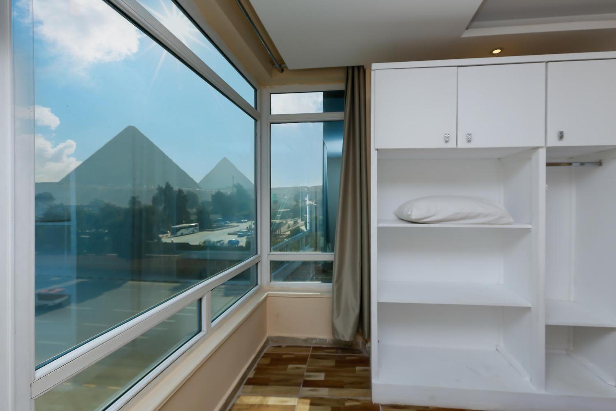 Turquoise Pyramids & Grand Egyptian Museum View Hotel Kafret el-Gabal