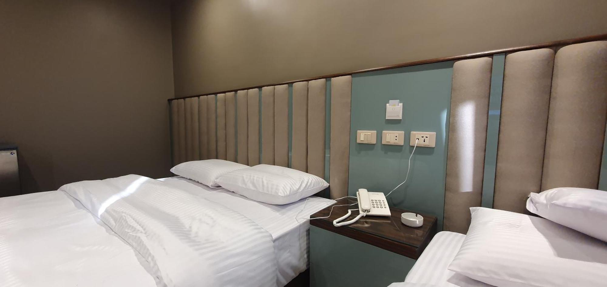 Grand Bayan & At Nile Plaza Hotel