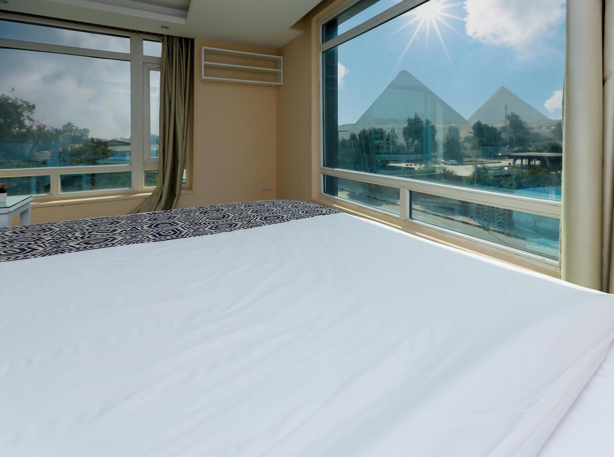 Turquoise Pyramids & Grand Egyptian Museum View