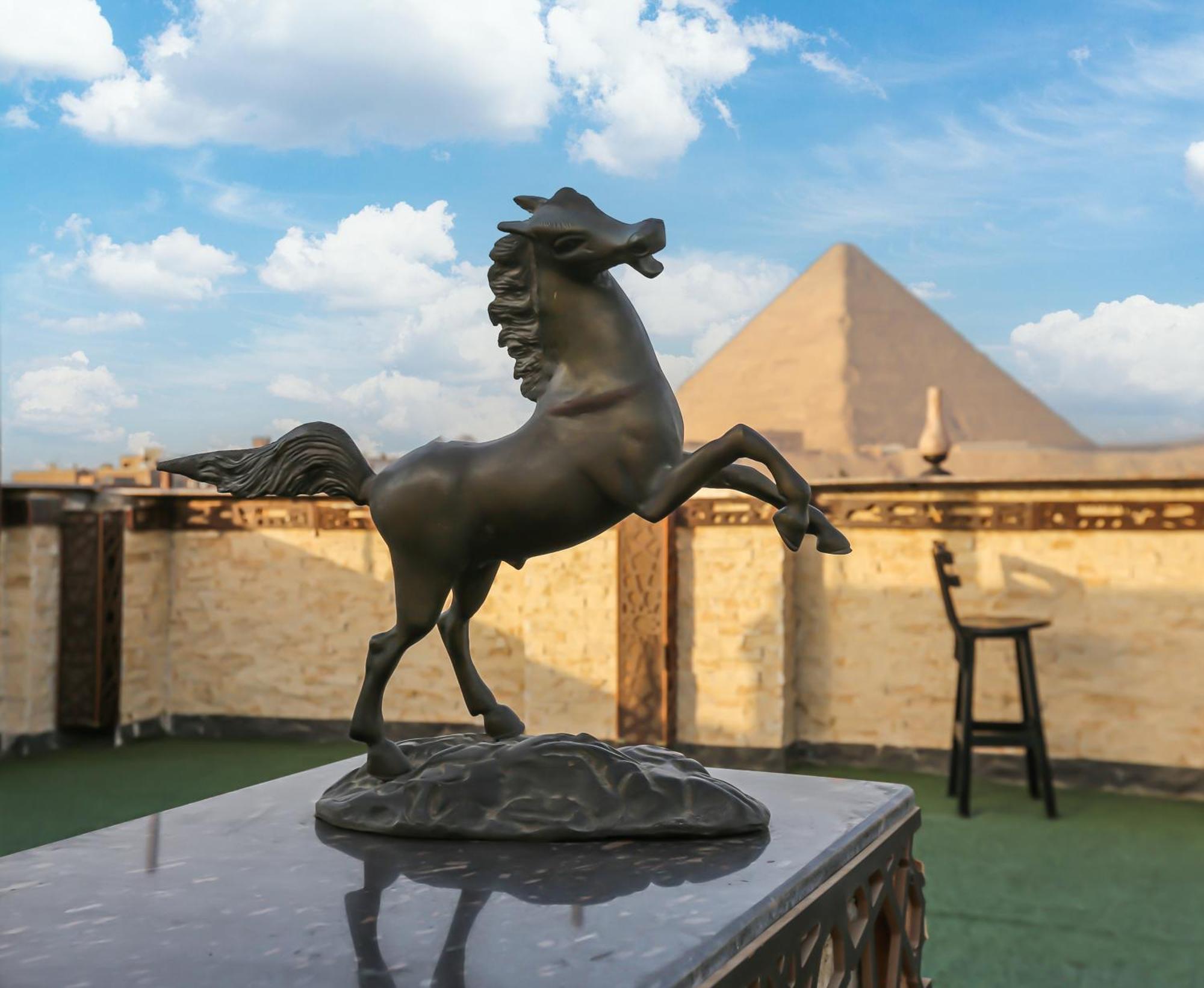 Master Pyramids * Al Kawm al Akhdar