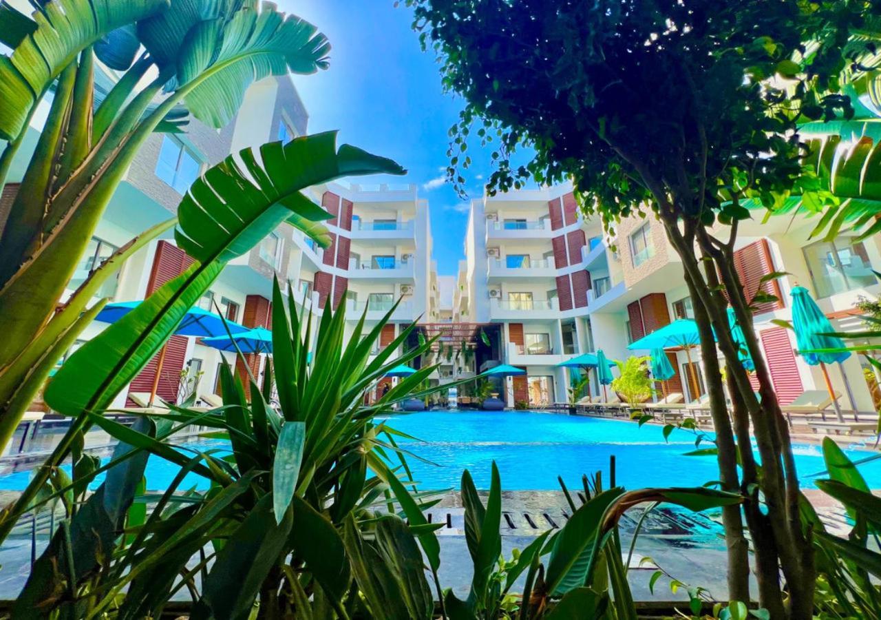 Sanctuary Sunlit Haven With 4 Pools, Rooftop Sunsets & Gourmet Bites Steps Away Apartment Hurghada