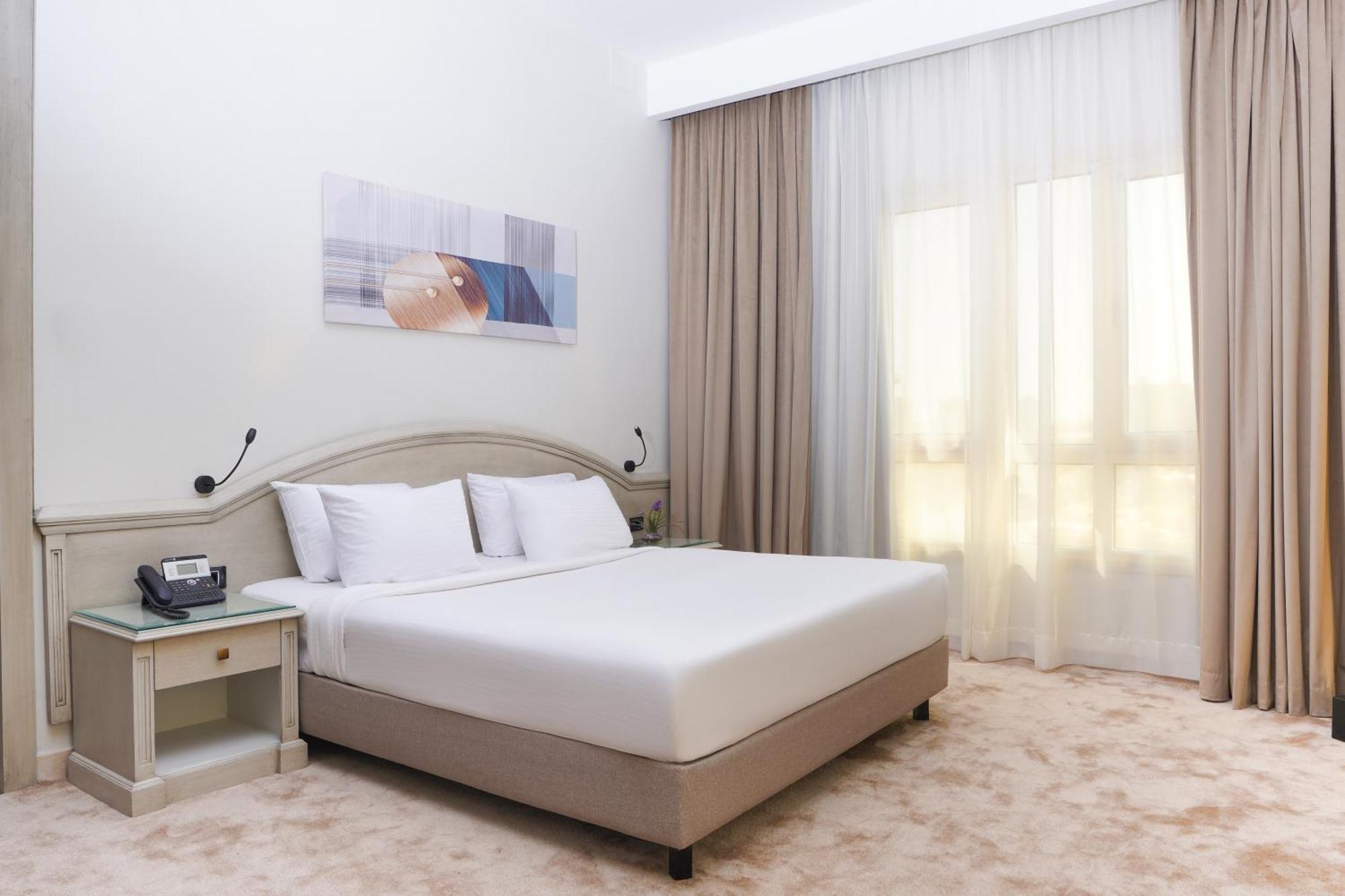 Triumph Plaza Hotel 4*