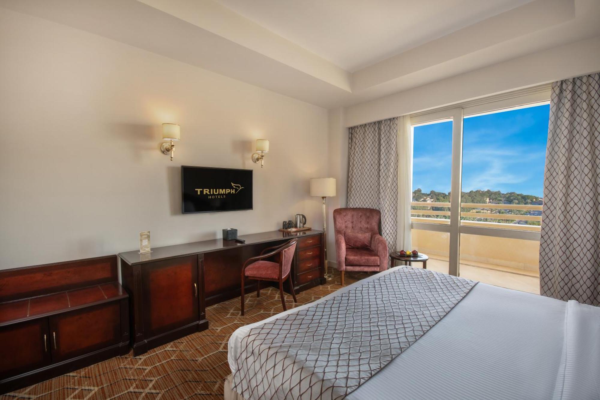 Triumph Plaza Hotel 4*