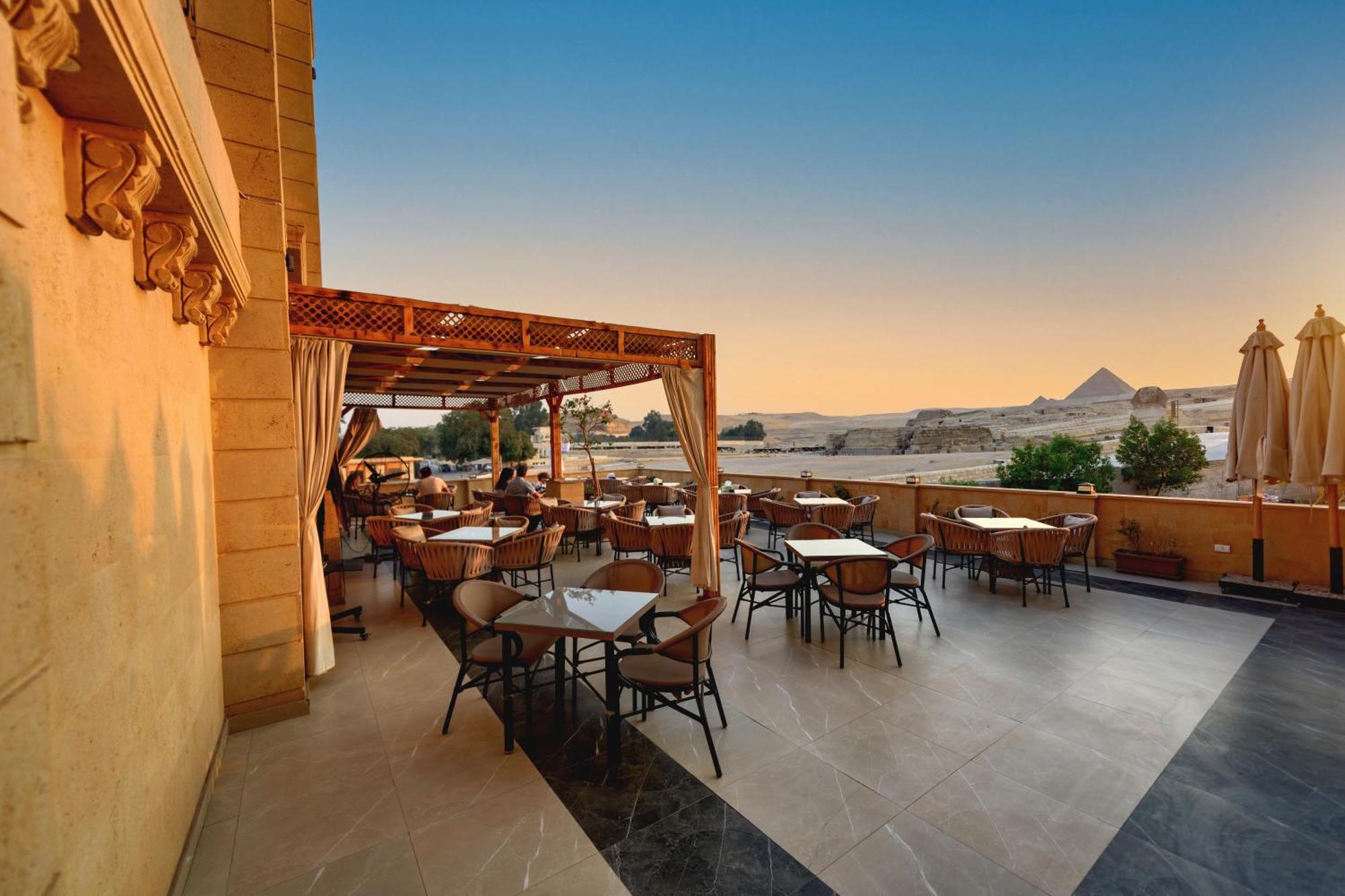 The Gate Front Pyramids & Sphinx View Kafrat al Jabal