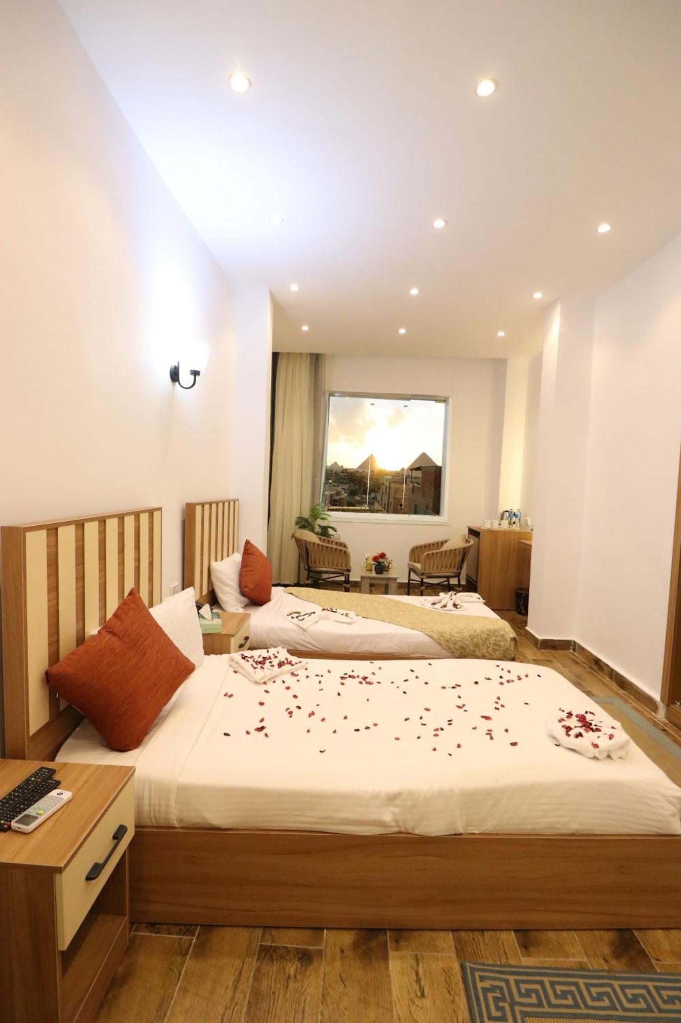 Hotel West Pyramids Kafrat al Jabal