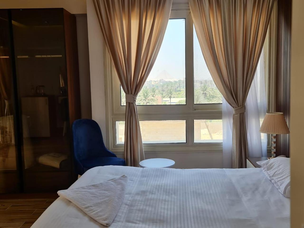 Pyramids Sunshine View Hotel Kafrat al Jabal