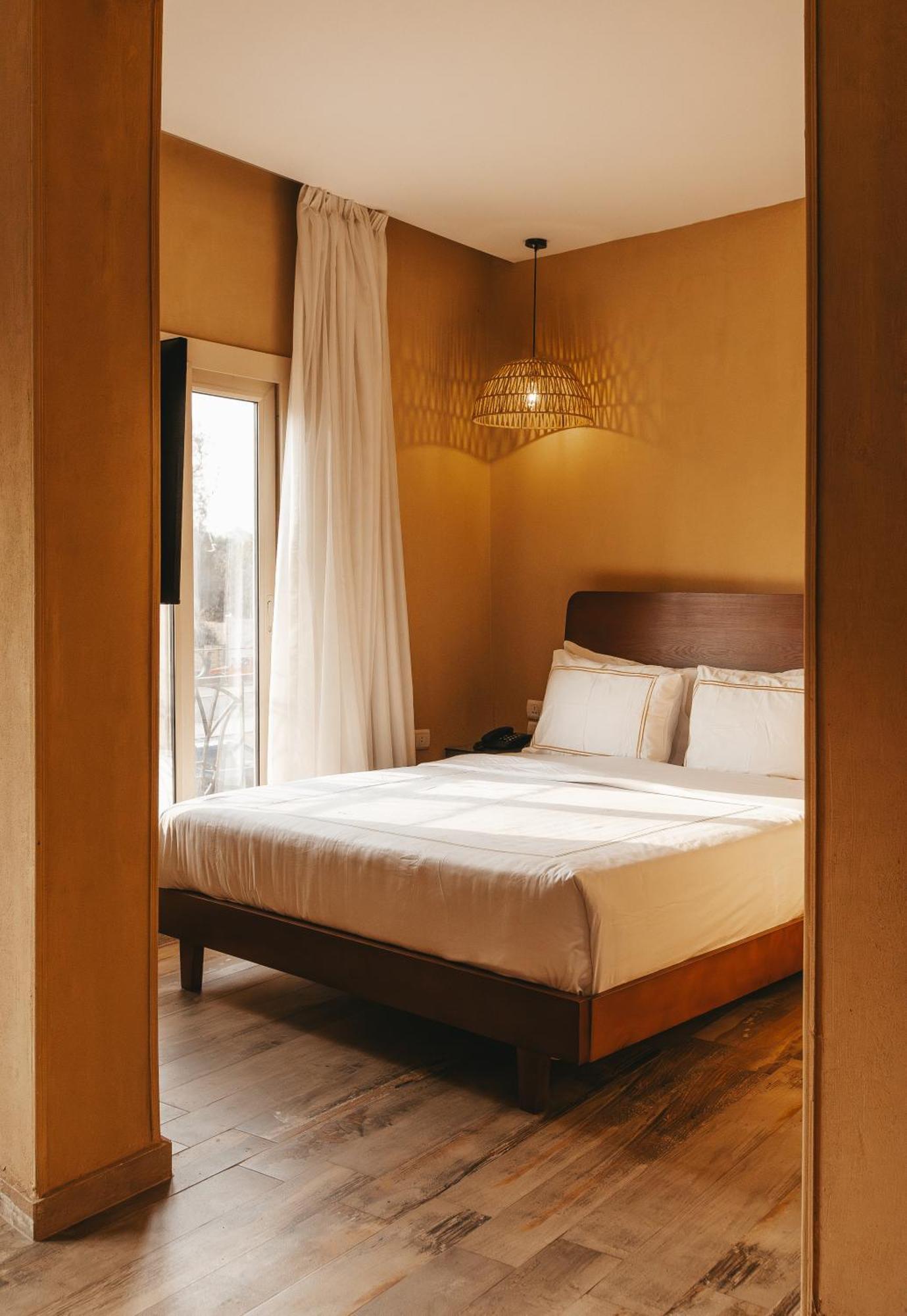 Otel Almas Pyramids Kafret el-Gabal