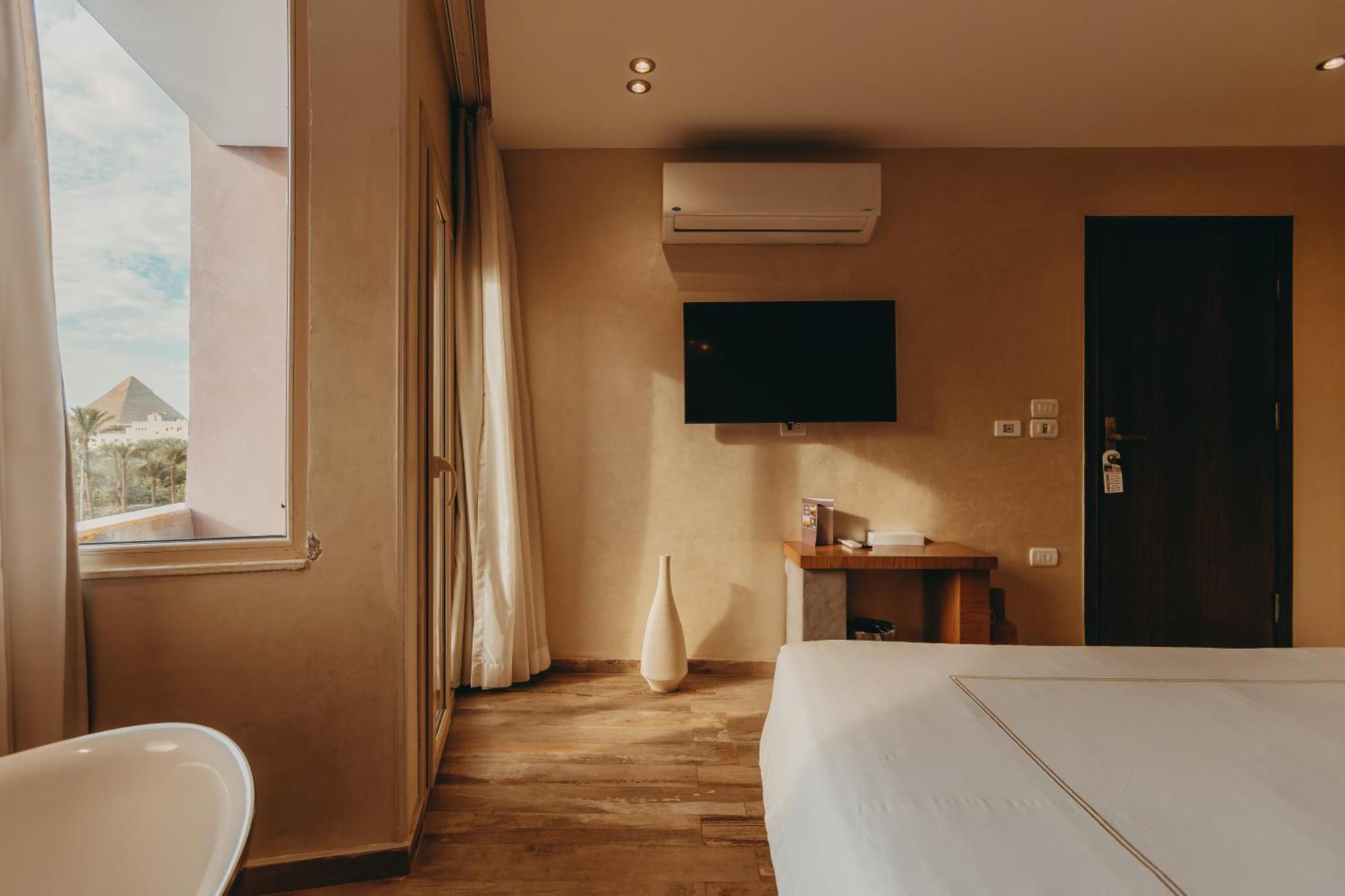 Otel Almas Pyramids Kafret el-Gabal