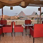 Al Fouad Pyramids View