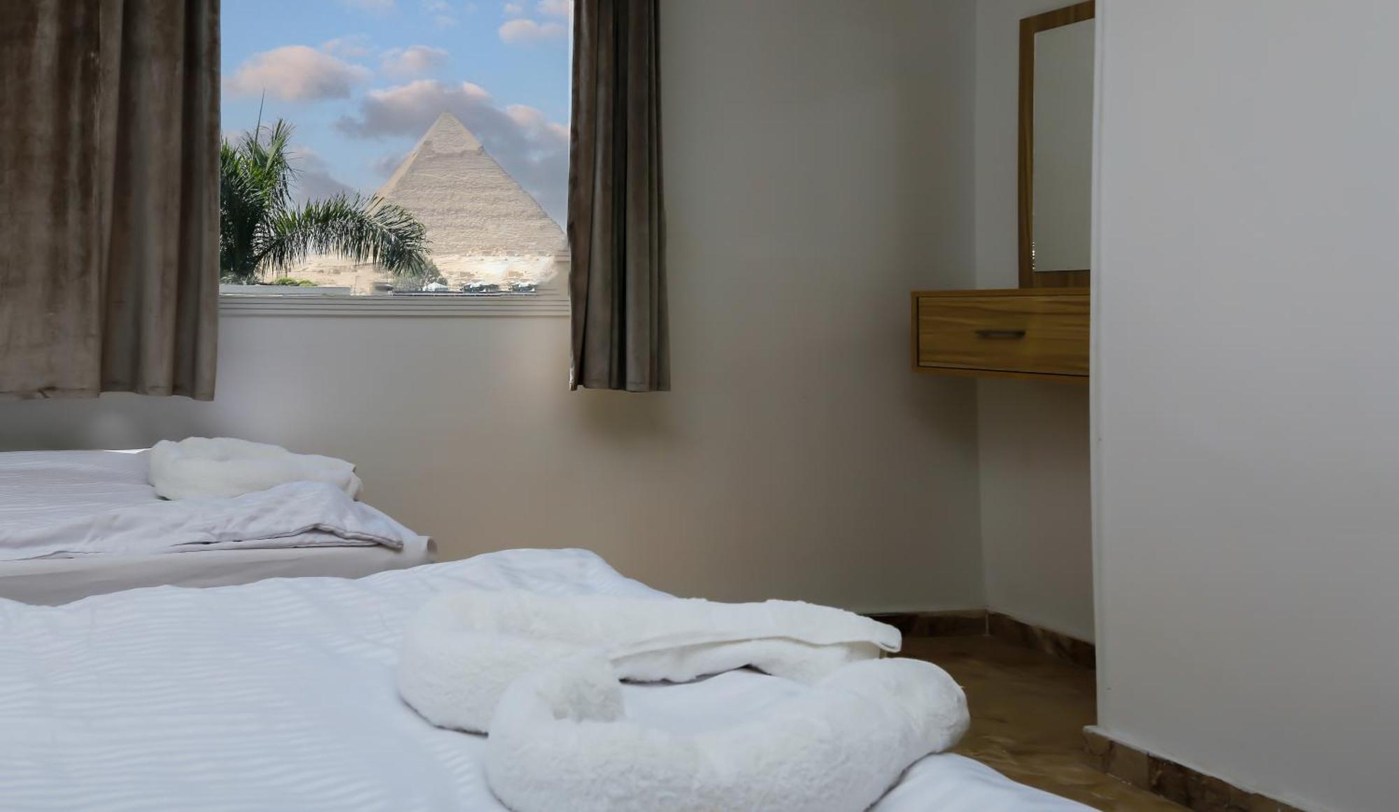 Pyramids Express View Kafrat al Jabal