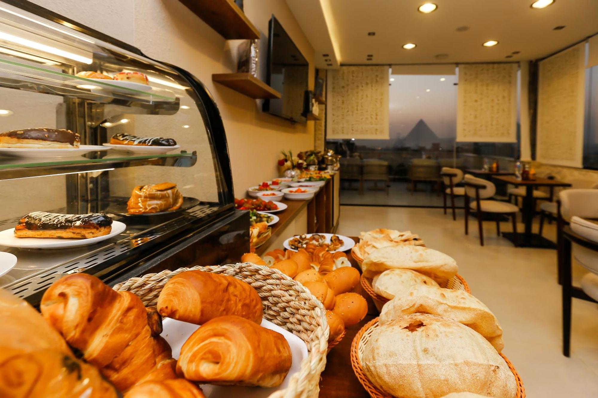 Aparthotel Rixoss Tower Pyramids View Nazlet el-Sisi
