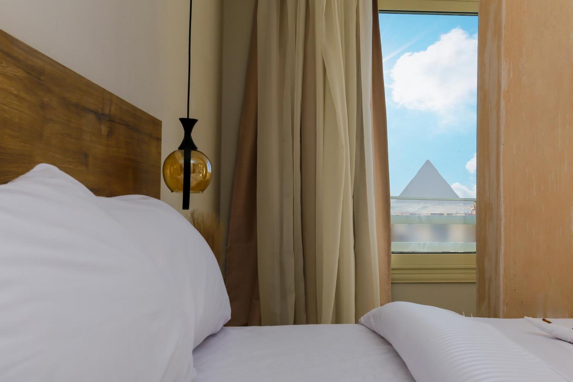 Rixoss Tower Pyramids View * Nazlet el-Sisi