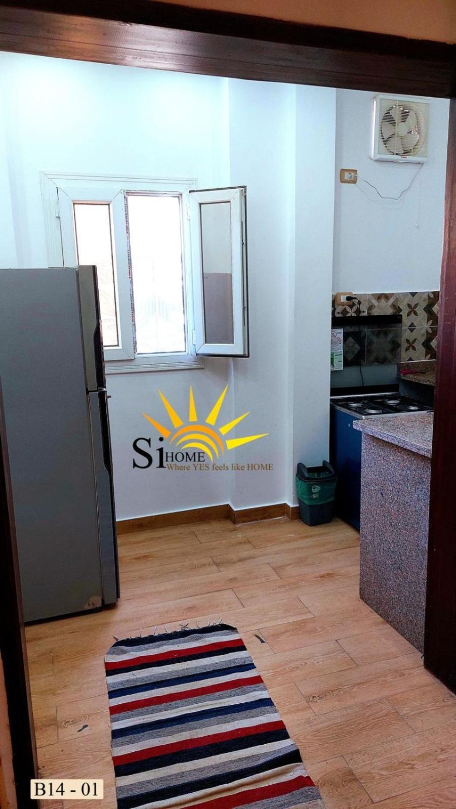 Si